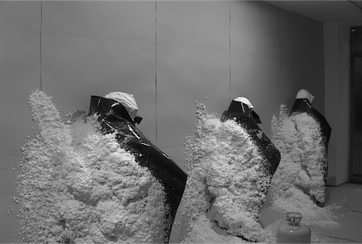 Santiago Sierra, POLYURETHANE SPRAYED ON THE BACKS OF 10 WORKERS, Lisson Gallery London, July 2004.